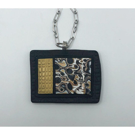 Black and white with gold pendant